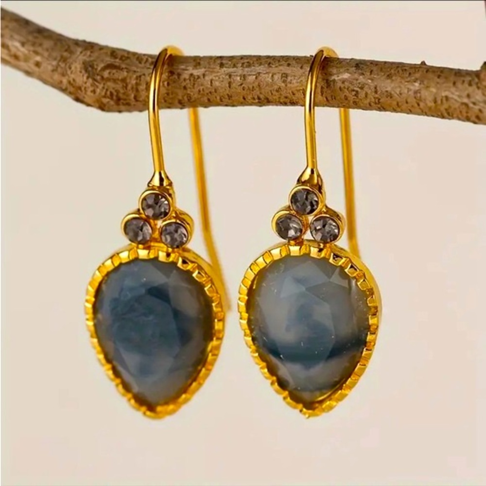 Smoky gray crystal in bright golden upside down teardrop earrings. NIP